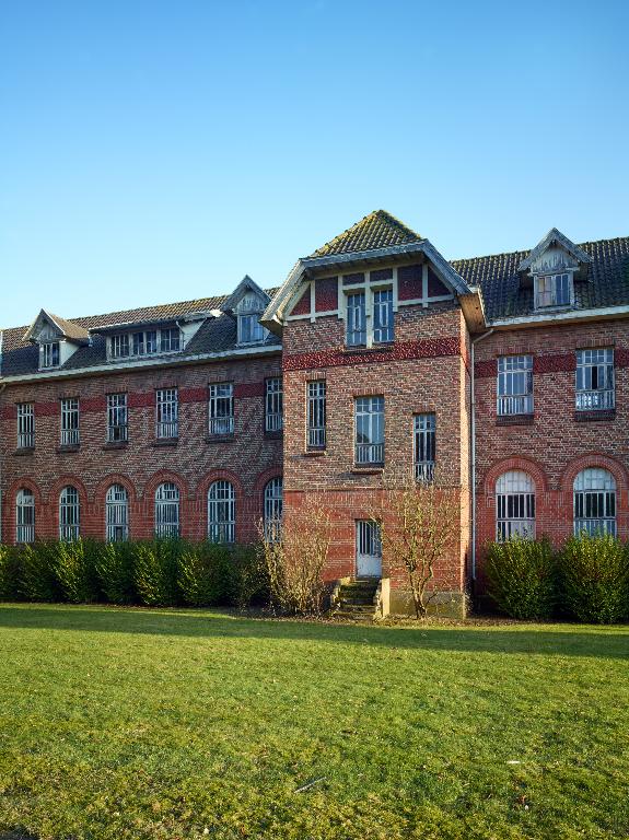 Ancien asile d'aliénés, puis hôpital psychiatrique, puis centre hospitalier spécialisé (CHS), dit établissement public de santé mentale des Flandres
