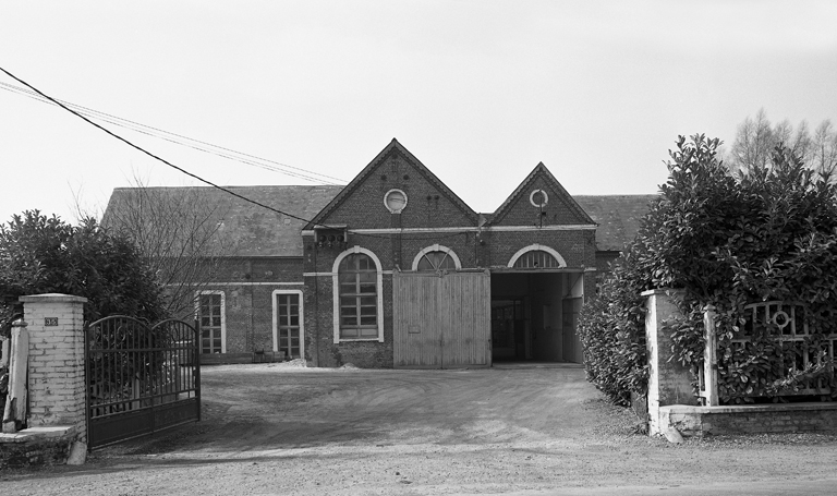 Ancienne filature de laine peignée Simon et Cie d'Esquéhéries, puis Carrissimo Fernand et Fils, puis Germ'Europe puis magasin industriel pour la confiturerie Materne de Boué