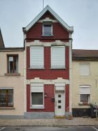 Maison à pignon sur rue couvert