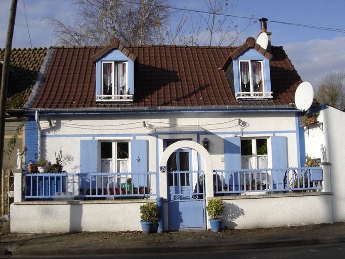 Maison à deux unités d'habitation