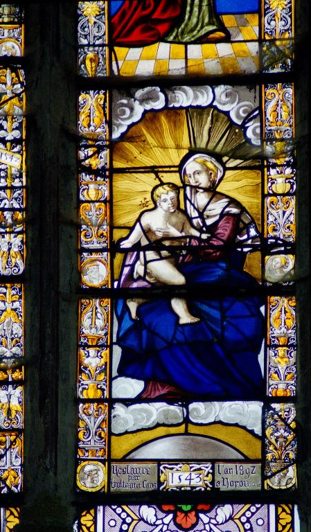 Verrière figurée (verrière mariale) : la Vierge des litanies, Vierge à l'Enfant, saint Michel terrassant le dragon et sainte Barbe (baie 0)