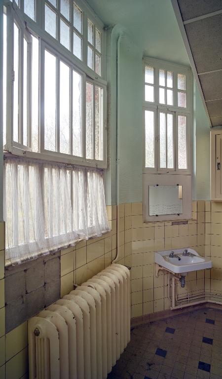 Ancien asile d'aliénés, puis hôpital psychiatrique, puis centre hospitalier spécialisé (CHS), dit établissement public de santé mentale des Flandres