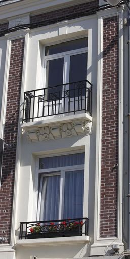 Maison de rapport à boutique