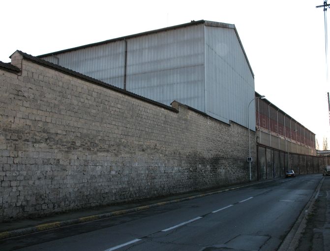 Ancienne usine de petite métallurgie (fabrique de limes) Mauroy, puis usine de construction mécanique, dite Ateliers de construction de Creil, puis Daydé-Pillé, actuellement pépinière d'entreprises