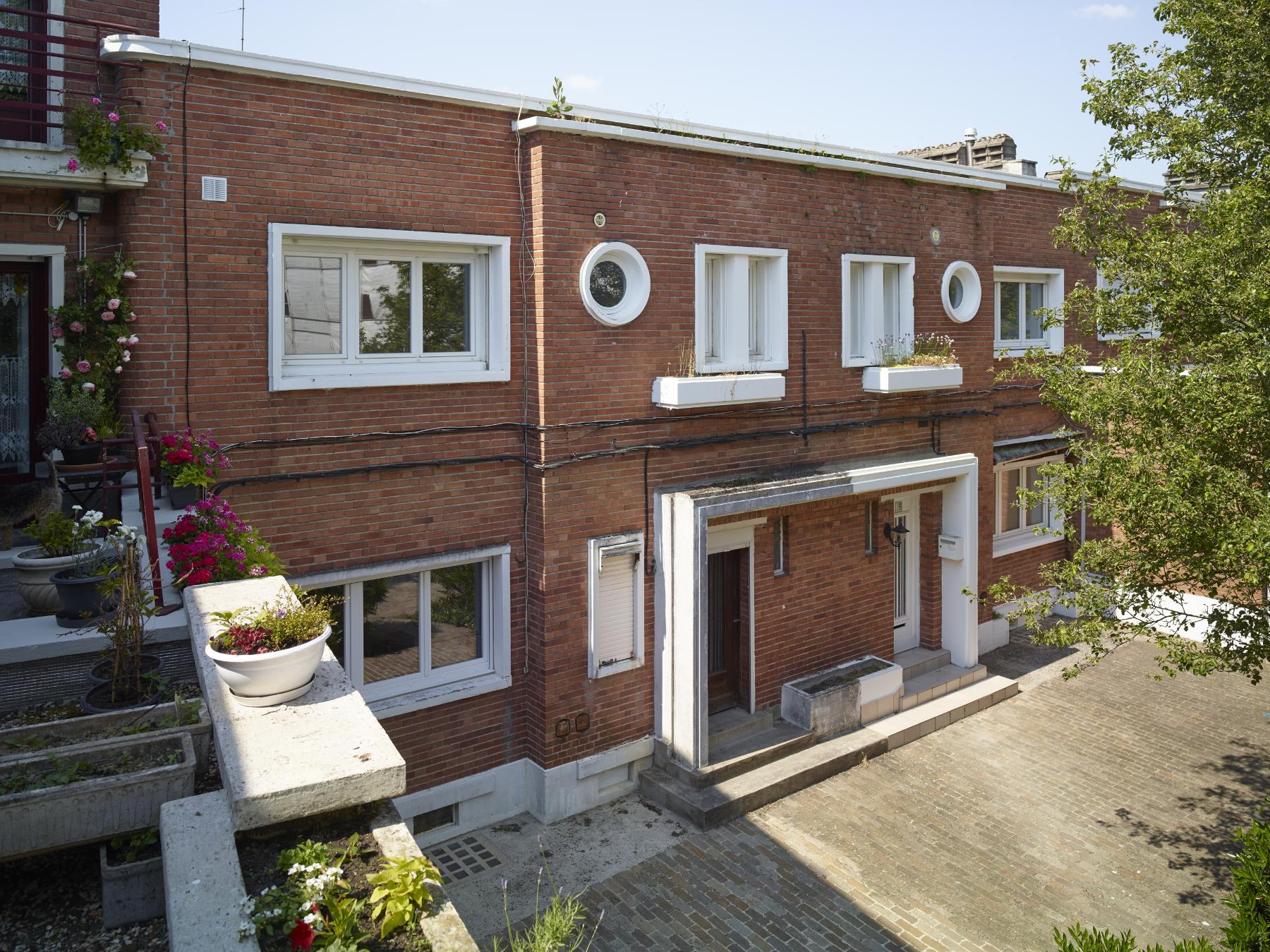 Série de maisons et d'immeubles à boutique (rue Fournier et place du Général-Leclerc)
