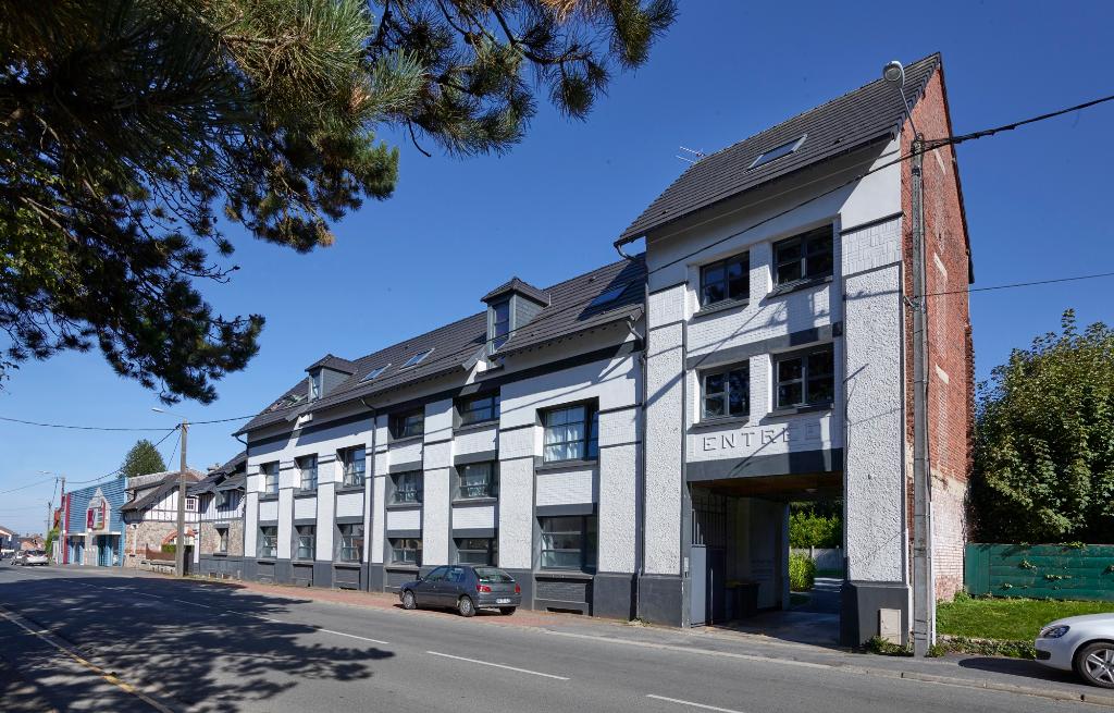 Ancien immeuble de bureaux de la scierie Lenain et Delcroix et logement patronal, puis immeuble à logements