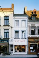 Ancienne usine de traitement des corps gras (fonderie de suif) Quénivet, actuellement magasin de commerce avec logement